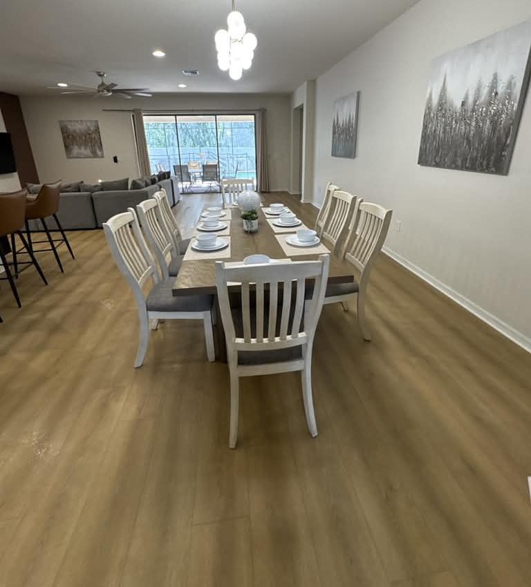 Long dining table set and ready for guests