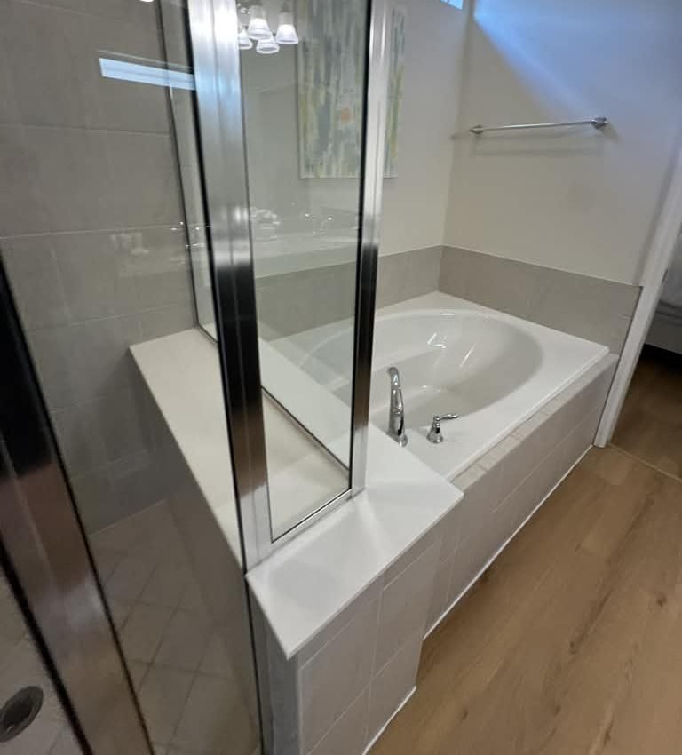 Garden tub and glass shower enclosure